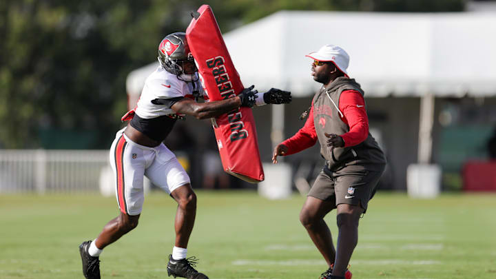 Jul 31, 2025; Tampa, FL, USA; Tampa Bay Buccaneers cornerback Benjamin Morrison (21) participates in training camp at AdventHealth Training Center. Mandatory Credit: Nathan Ray Seebeck-Imagn Images