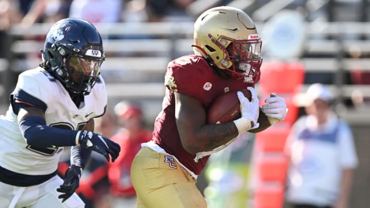 Oct 28, 2023; Chestnut Hill, Massachusetts, USA; Boston College Eagles running back Kye Robichaux (5) runs for a touchdown against the Connecticut Huskies during the second half at Alumni Stadium. Mandatory Credit: Brian Fluharty-USA TODAY Sports Oct 28, 2023; Chestnut Hill, Massachusetts, USA; Boston College Eagles running back Kye Robichaux (5) runs for a touchdown against the Connecticut Huskies during the second half at Alumni Stadium. Mandatory Credit: Brian Fluharty-USA TODAY Sports