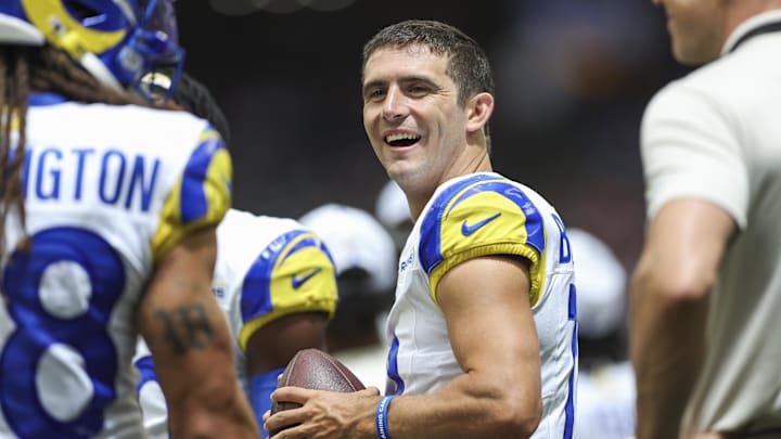 Aug 24, 2024; Houston, Texas, USA; Los Angeles Rams quarterback Stetson Bennett (13) on the sideline during the first quarter against the Houston Texans at NRG Stadium. Mandatory Credit: Troy Taormina-Imagn Images