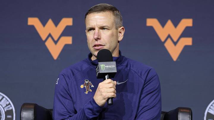 Oct 21, 2026; Kansas City, MO, USA; West Virginia coach Ross Hodge is interviewed during the big 12 Media Days at T-Mobile Center. Mandatory Credit: William Purnell-Imagn Images Oct 21, 2026; Kansas City, MO, USA; West Virginia coach Ross Hodge is interviewed during the big 12 Media Days at T-Mobile Center. Mandatory Credit: William Purnell-Imagn Images