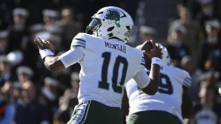 Nov 16, 2024; Annapolis, Maryland, USA; Tulane Green Wave quarterback Darian Mensah (10) drops back to pass during the first quarter against the Navy Midshipmen   at Navy-Marine Corps Memorial Stadium.