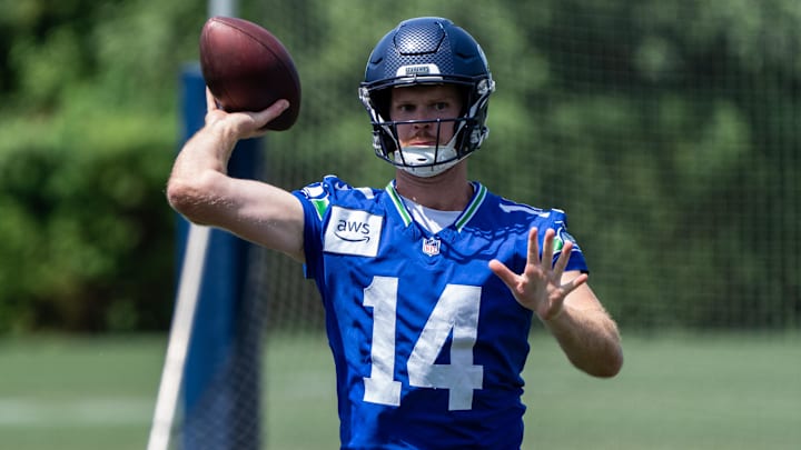 Seattle Seahawks quarterback Sam Darnold passes the ball during mini-camp at Virginia Mason Athletic Center. Seattle Seahawks quarterback Sam Darnold passes the ball during mini-camp at Virginia Mason Athletic Center.