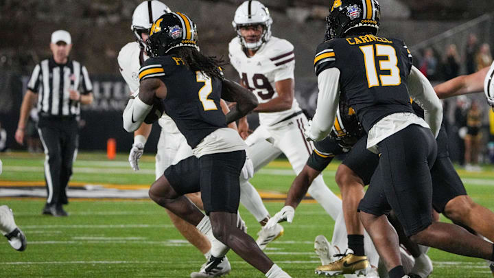 Missouri Tigers cornerback Toriano Pride Jr. (2) recovers a fumble, in a game against the Mississippi State Bulldogs this season.