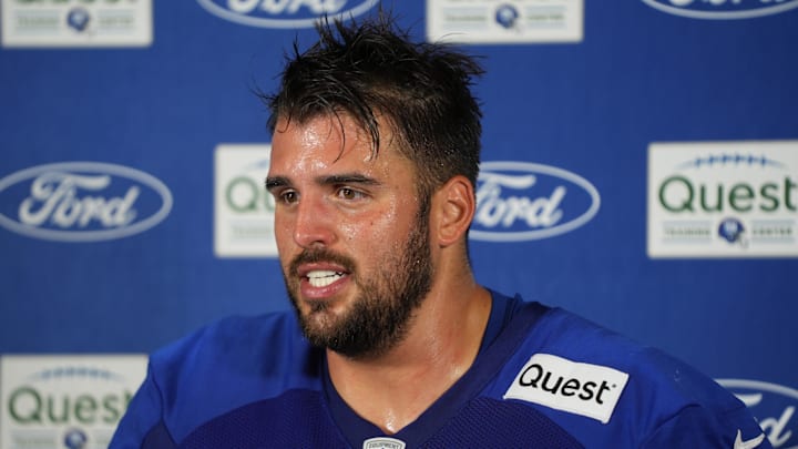 Jul 26, 2024; East Rutherford, NJ, USA; New York Giants offensive guard Jon Runyan (76) speaks at a press conference after training camp at Quest Diagnostics Training Center. Mandatory Credit: Lucas Boland-Imagn Images
