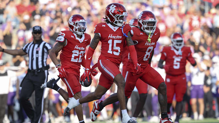 Houston Cougars defensive back Will James (15) celebrates after an interception during the second quarter against the TCU Horned Frogs at TDECU Stadium. 