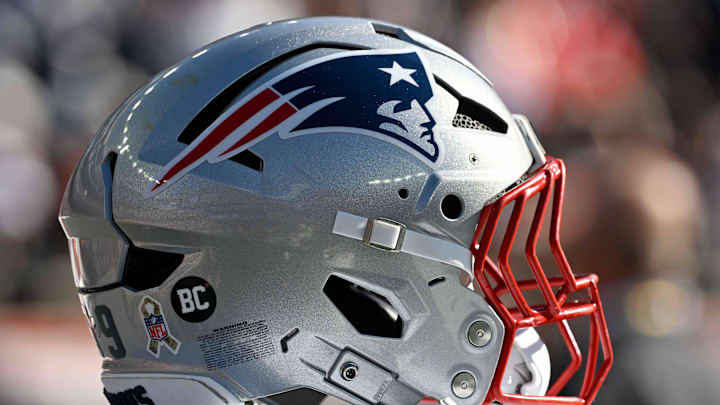 Nov 2, 2025; Foxborough, Massachusetts, USA; A New England Patriots helmet sits on game day equipment before a game against the Atlanta Falcons at Gillette Stadium. Mandatory Credit: Eric Canha-Imagn Images