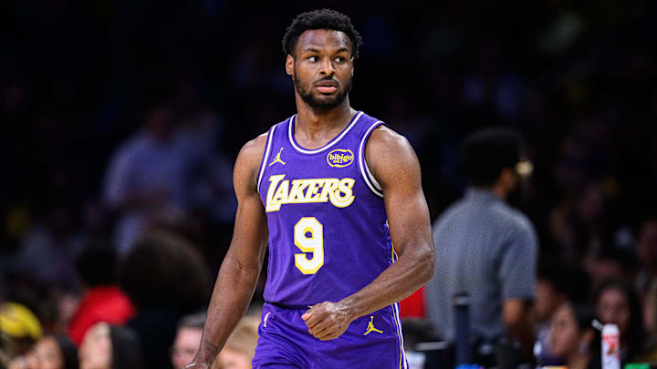 Mar 27, 2026; Los Angeles, California, USA; Los Angeles Lakers guard Bronny James (9) walks onto the court during the first half against the Brooklyn Nets at Crypto.com Arena. Mandatory Credit: William Liang-Imagn Images