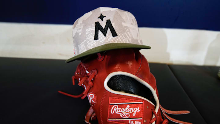 May 16, 2025; Milwaukee, Wisconsin, USA; General view of a Minnesota Twins military-inspired baseball cap in the dugout prior to the game against the Milwaukee Brewers at American Family Field. Mandatory Credit: Jeff Hanisch-Imagn Images May 16, 2025; Milwaukee, Wisconsin, USA; General view of a Minnesota Twins military-inspired baseball cap in the dugout prior to the game against the Milwaukee Brewers at American Family Field. Mandatory Credit: Jeff Hanisch-Imagn Images