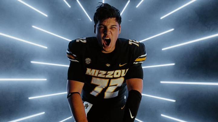 Southlake Carroll offensive lineman Tristan Dare gets excited during a photoshoot on his official visit to the University of Missouri. Southlake Carroll offensive lineman Tristan Dare gets excited during a photoshoot on his official visit to the University of Missouri.