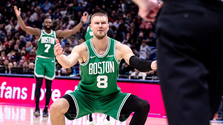 Jan 31, 2025; New Orleans, Louisiana, USA; Boston Celtics center Kristaps Porzingis (8) reacts to penalty called against him by referee Ed Malloy (14) against the New Orleans Pelicans during the second half at Smoothie King Center. Mandatory Credit: Stephen Lew-Imagn Images Jan 31, 2025; New Orleans, Louisiana, USA; Boston Celtics center Kristaps Porzingis (8) reacts to penalty called against him by referee Ed Malloy (14) against the New Orleans Pelicans during the second half at Smoothie King Center. Mandatory Credit: Stephen Lew-Imagn Images
