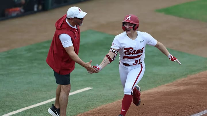 Alabama Head Coach Patrick Murphy and Alabama Softball Player Alexis Pupillo (31) in action against Florida State during the Dugout Club Classic at Joanne Graf Field in Tallahassee, FL on Saturday, Feb 21, 2026.