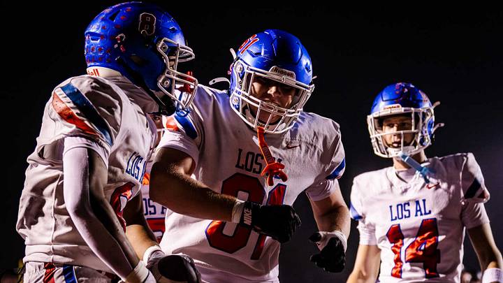 Los Alamitos celebrates a touchdown against San Clemente in the 2025 CIF Southern Section Division 2 final on December 4.