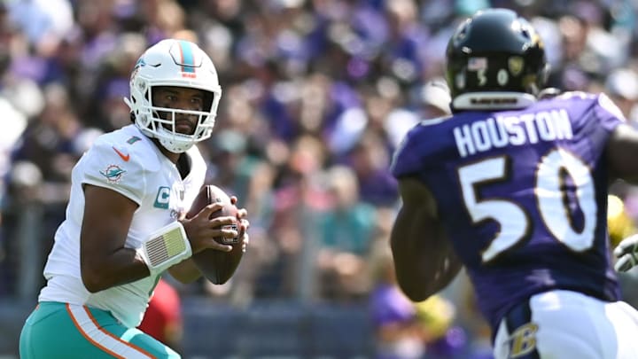 Miami Dolphins quarterback Tua Tagovailoa 1 drops back to pass as Baltimore Ravens linebacker Justin Houston 50 rushes during the first half at M&;T Bank Stadium in September 2022.
