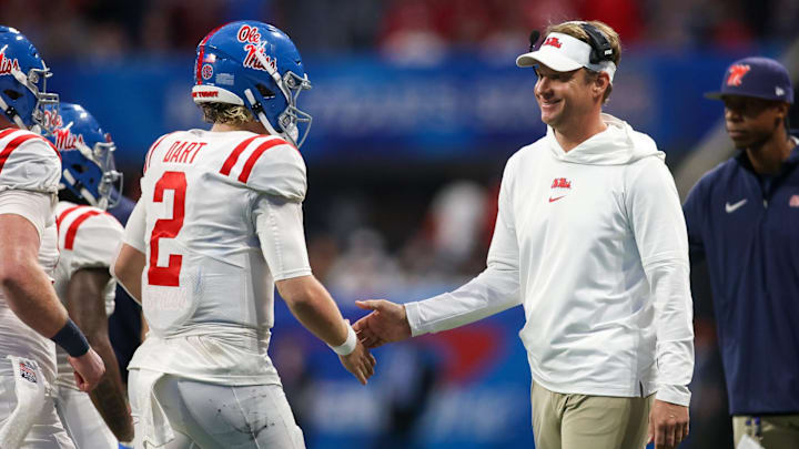 Dec 30, 2023; Atlanta, GA, USA; Mississippi Rebels head coach Lane Kiffin celebrates with