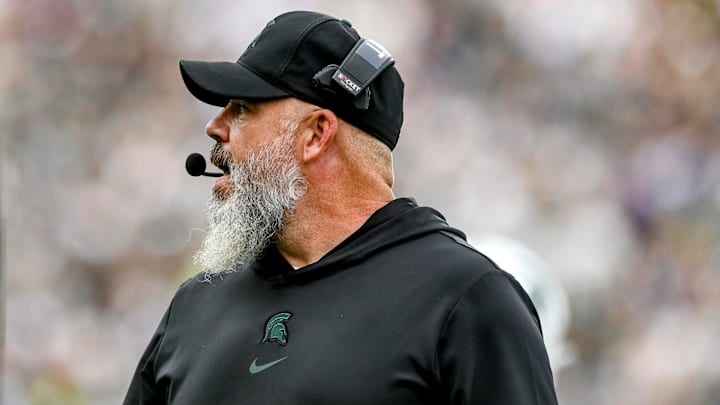 Michigan State's defensive coordinator Scottie Hazelton coaches from the sideline during the Spartans football game against Washington on Saturday, Sept. 16, 2023, at Spartan Stadium in East Lansing.