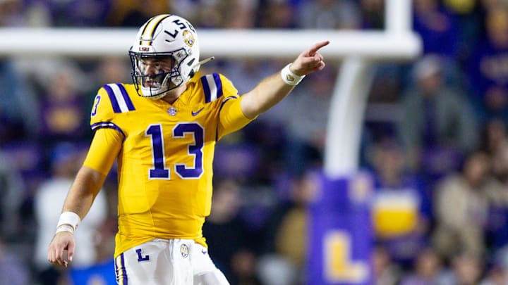 Nov 23, 2024; Baton Rouge, Louisiana, USA;  LSU Tigers quarterback Garrett Nussmeier (13) signals a first down against the Vanderbilt Commodores during the second half at Tiger Stadium. Mandatory Credit: Stephen Lew-Imagn Images