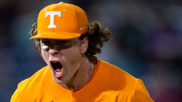 Tennessee pitcher Chase Dollander (11) celebrates