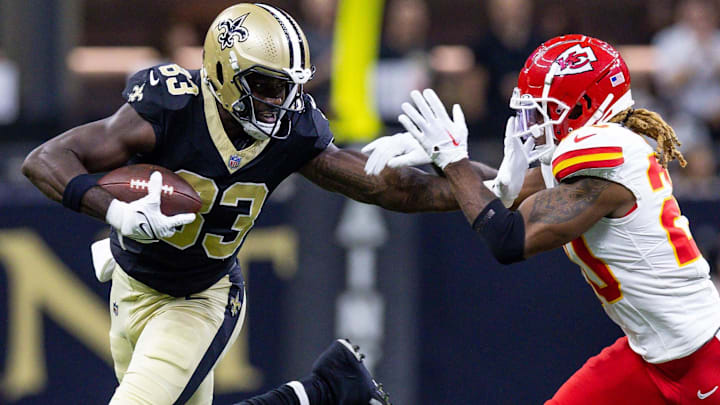 New Orleans Saints tight end Juwan Johnson (83) runs past Kansas City Chiefs safety Justin Reid (20)