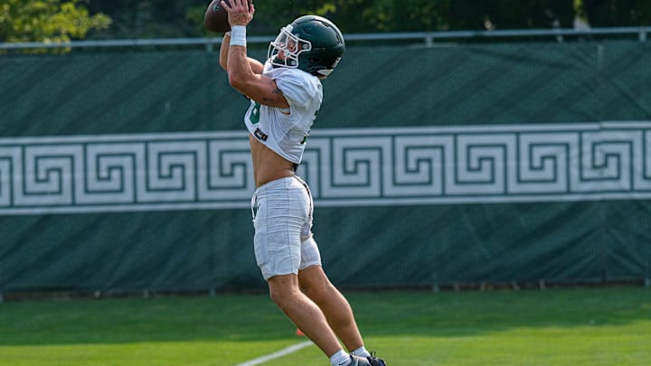 Michigan State's Caleb Gash (15) grabs a pass during practice Tuesday, Aug. 5, 2025.