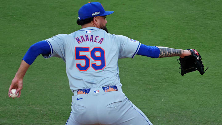 Oct 20, 2024; Los Angeles, California, USA; New York Mets pitcher Sean Manaea (59) pitches during the second inning against the Los Angeles Dodgers during game six of the NLCS for the 2024 MLB playoffs at Dodger Stadium