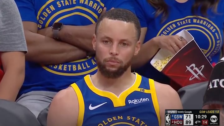 Stephen Curry staring into space. 