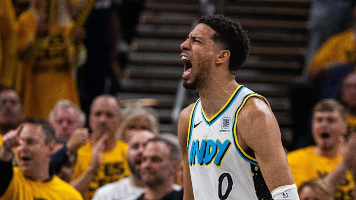 Apr 29, 2025; Indianapolis, Indiana, USA; Indiana Pacers guard Tyrese Haliburton (0) reacts during a time out during game five of the first round for the 2024 NBA Playoffs against the Milwaukee Bucks at Gainbridge Fieldhouse. Mandatory Credit: Trevor Ruszkowski-Imagn Images