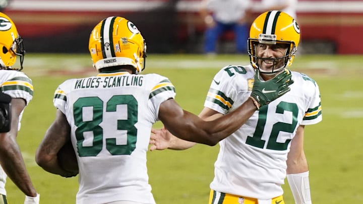 Nov 5, 2020; Santa Clara, California, USA; Green Bay Packers wide receiver Marquez Valdes-Scantling (83) celebrates with quarterback Aaron Rodgers (12) after catching a pass to score a touchdown against the San Francisco 49ers during the second quarter at Levi's Stadium. Mandatory Credit: Kyle Terada-Imagn Images