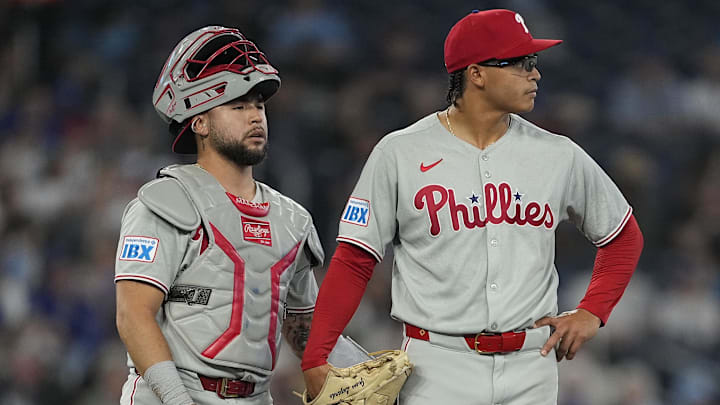 Jun 5, 2025; Toronto, Ontario, CAN; Philadelphia Phillies catcher Rafael Marchan (13) and starting pitcher Jesus Luzardo (44) look towards the bullpen after giving up four runs in the third inning against the Toronto Blue Jays at Rogers Centre