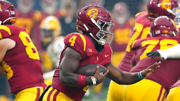 Sep 1, 2024; Paradise, Nevada, USA; Southern California Trojans running back Woody Marks (4) rushes against the LSU Tigers during the first quarter at Allegiant Stadium. Mandatory Credit: Stephen R. Sylvanie-Imagn Images