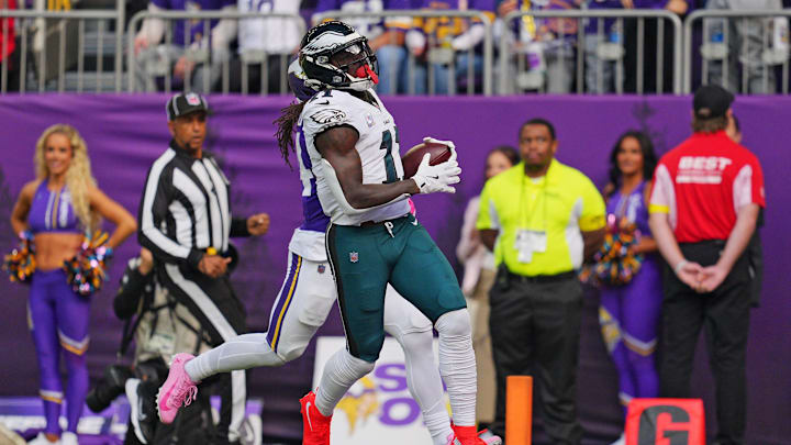 Oct 19, 2025; Minneapolis, Minnesota, USA; Philadelphia Eagles wide receiver A.J. Brown (11) catches a pass for a touchdown during the first half against the Minnesota Vikings at U.S. Bank Stadium. Mandatory Credit: Brad Rempel-Imagn Images