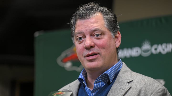 Dec 13, 2025; Saint Paul, Minnesota, USA;  Minnesota Wild general manger Bill Guerin addresses the media about acquiring defensemen Quinn Hughes via trade from the Vancouver Canucks before a game against the Ottawa Senators at Grand Casino Arena. Mandatory Credit: Nick Wosika-Imagn Images