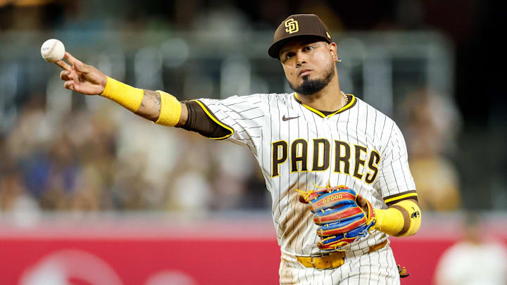 Sep 13, 2025; San Diego, California, USA; San Diego Padres second baseman Luis Arraez (4) throws to first base for an out during the seventh inning against the Colorado Rockies at Petco Park. Mandatory Credit: David Frerker-Imagn Images Sep 13, 2025; San Diego, California, USA; San Diego Padres second baseman Luis Arraez (4) throws to first base for an out during the seventh inning against the Colorado Rockies at Petco Park. Mandatory Credit: David Frerker-Imagn Images