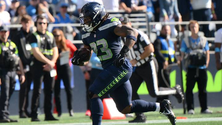 Seattle Seahawks running back Emanuel Wilson (23) runs for a touchdown against the Los Angeles Chargers during the first half at Lumen Field. Mandatory Credit: Steven Bisig-Imagn Images Seattle Seahawks running back Emanuel Wilson (23) runs for a touchdown against the Los Angeles Chargers during the first half at Lumen Field. Mandatory Credit: Steven Bisig-Imagn Images