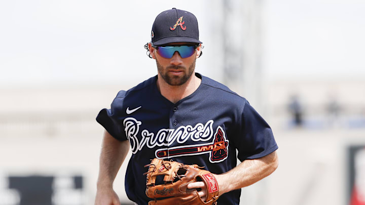 Mar 12, 2020; Lakeland, Florida, USA;  Atlanta Braves infielder Charlie Culberson (8) runs into the