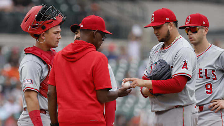 Aug 29, 2024; Detroit, Michigan, USA; Los Angeles Angels manager Ron Washington (37) take the ball to relieve pitcher Jose Quijada (65) in the eighth inning against the Detroit Tigers at Comerica Park. Mandatory Credit: Rick Osentoski-Imagn Images Aug 29, 2024; Detroit, Michigan, USA; Los Angeles Angels manager Ron Washington (37) take the ball to relieve pitcher Jose Quijada (65) in the eighth inning against the Detroit Tigers at Comerica Park. Mandatory Credit: Rick Osentoski-Imagn Images