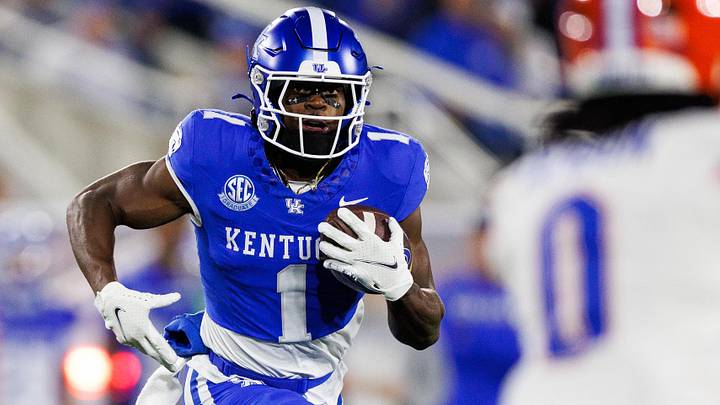 Nov 8, 2025; Lexington, Kentucky, USA; Kentucky Wildcats wide receiver Kendrick Law (1) runs the ball during the first quarter against the Florida Gators at Kroger Field. Mandatory Credit: Jordan Prather-Imagn Images