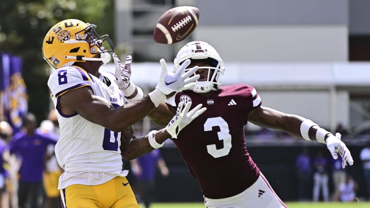 Sep 16, 2023; Starkville, Mississippi, USA; LSU Tigers wide receiver Malik Nabers (8) vs Decamerion Richardson (3) of Mississippi State.