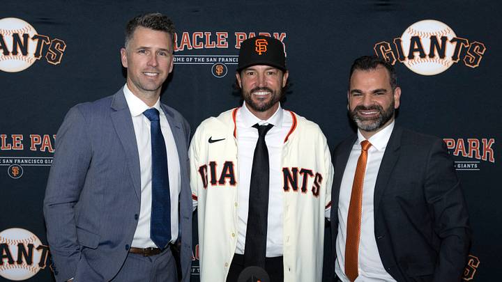 Oct 30, 2025; San Francisco, CA, USA;  Tony Vitello (center) is introduced as the new manager of the San Francisco Giants by president of baseball operations Buster Posey (left) and general manager Zack Minasian at Oracle Park. Mandatory Credit: D. Ross Cameron-Imagn Images