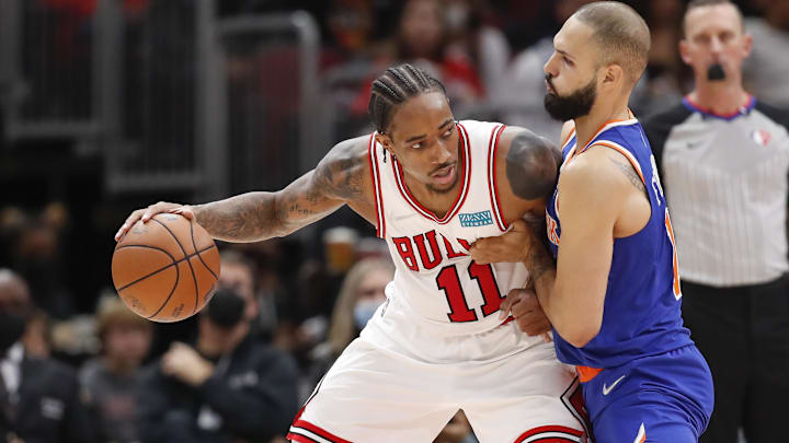 DeMar DeRozan posts up Evan Fournier.