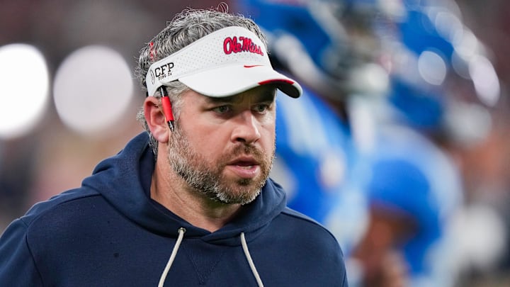 Ole Miss head coach Pete Golding runs off the field during warmups before the CFP Fiesta Bowl at the State Farm Stadium, in Glendale, Ariz., on Thursday, Jan. 8, 2026.