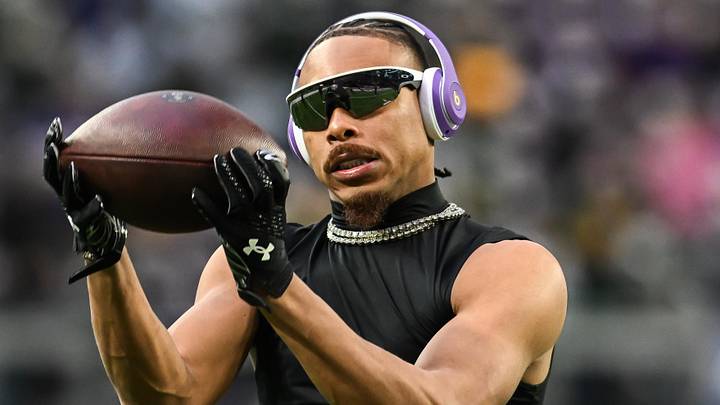 Minnesota Vikings wide receiver Justin Jefferson (18) warms up prior to the game against the Green Bay Packers at U.S. Bank Stadium.