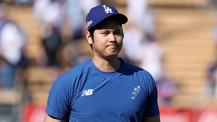 Oct 20, 2024; Los Angeles, California, USA; Los Angeles Dodgers designated hitter Shohei Ohtani (17) looks on during warm ups before game six against the New York Mets in the NLCS for the 2024 MLB playoffs at Dodger Stadium. Mandatory Credit: Kiyoshi Mio-Imagn Images Oct 20, 2024; Los Angeles, California, USA; Los Angeles Dodgers designated hitter Shohei Ohtani (17) looks on during warm ups before game six against the New York Mets in the NLCS for the 2024 MLB playoffs at Dodger Stadium. Mandatory Credit: Kiyoshi Mio-Imagn Images
