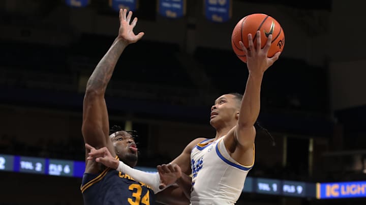 Jan 1, 2025; Pittsburgh, Pennsylvania, USA; Pittsburgh Panthers guard Jaland Lowe (15) shoots against California Golden Bears forward Lee Dort (34) during the second half at the Petersen Events Center. Mandatory Credit: Charles LeClaire-Imagn Images Jan 1, 2025; Pittsburgh, Pennsylvania, USA; Pittsburgh Panthers guard Jaland Lowe (15) shoots against California Golden Bears forward Lee Dort (34) during the second half at the Petersen Events Center. Mandatory Credit: Charles LeClaire-Imagn Images