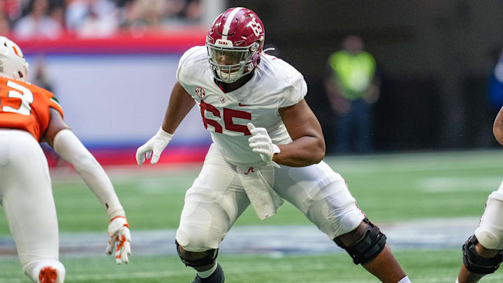 Sep 4, 2021; Atlanta, Georgia, USA; Alabama Crimson Tide offensive lineman JC Latham (65) blocks