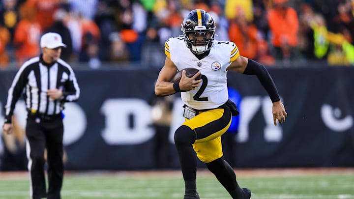 Dec 1, 2024; Cincinnati, Ohio, USA; Pittsburgh Steelers quarterback Justin Fields (2) runs with the ball against the Cincinnati Bengals in the second half at Paycor Stadium. Mandatory Credit: Katie Stratman-Imagn Images