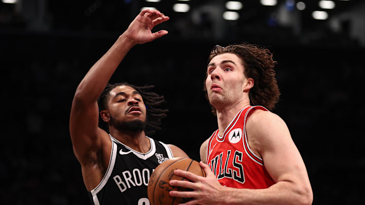 Nov 1, 2024; Brooklyn, New York, USA; Chicago Bulls guard Josh Giddey (3) drives to the basket against Brooklyn Nets guard Cam Thomas (24) during the first quarter at Barclays Center. Mandatory Credit: Vincent Carchietta-Imagn Images