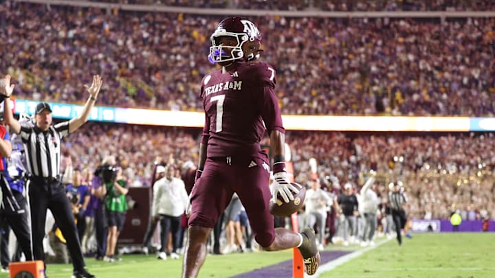 Oct 25, 2025; Baton Rouge, Louisiana, USA; Texas A&M Aggies wide receiver KC Concepcion (7) returns a punt for a touchdown during the second half against the Louisiana State Tigers at Tiger Stadium. Mandatory Credit: Stephen Lew-Imagn Images
