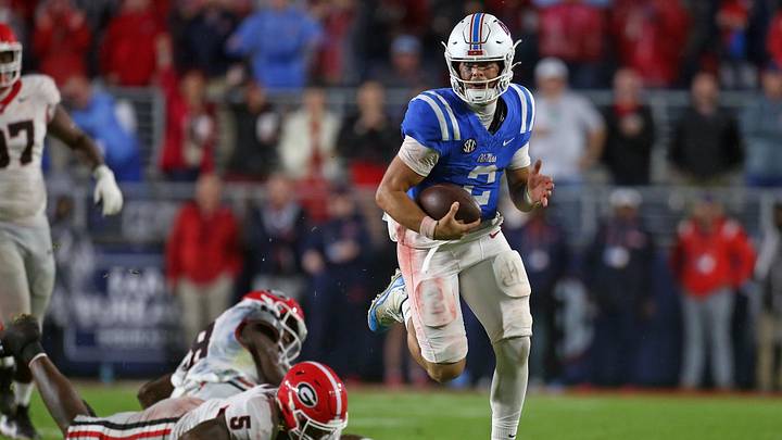Nov 9, 2024; Oxford, Mississippi, USA; Mississippi Rebels quarterback Jaxson Dart (2) runs the ball during the second half against the Georgia Bulldogs at Vaught-Hemingway Stadium. Mandatory Credit: Petre Thomas-Imagn Images Nov 9, 2024; Oxford, Mississippi, USA; Mississippi Rebels quarterback Jaxson Dart (2) runs the ball during the second half against the Georgia Bulldogs at Vaught-Hemingway Stadium. Mandatory Credit: Petre Thomas-Imagn Images