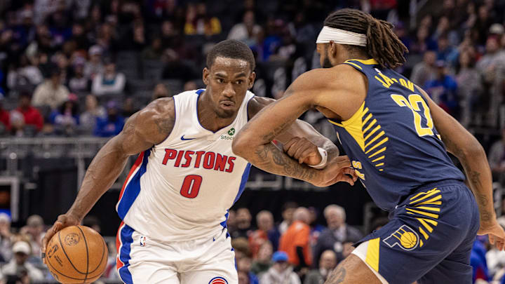 Nov 17, 2025; Detroit, Michigan, USA; Indiana Pacers forward Isaiah Jackson (22) defends against Detroit Pistons center Jalen Duren (0) during the first quarter at Little Caesars Arena. Mandatory Credit: David Reginek-Imagn Images