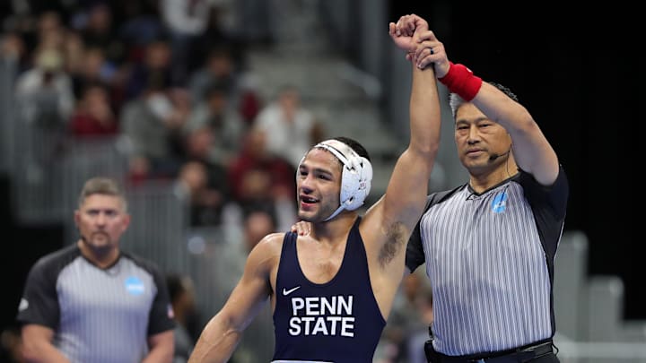 Penn State’s Shayne Van Ness celebrates a victory at the NCAA Wrestling championships at Rocket Arena.